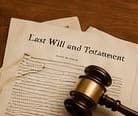 A will and testament beside a gavel